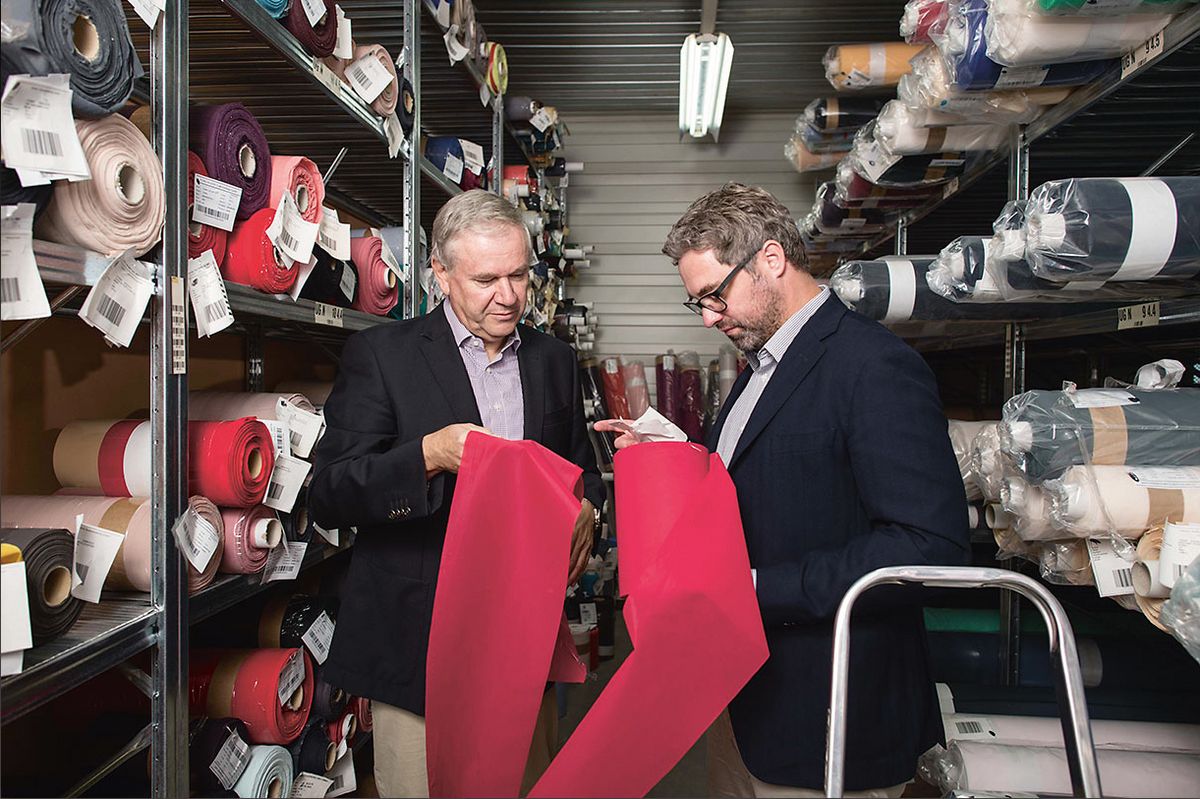 Managing director Wolfgang Mager with Peter Fischer in the Mitex fabric warehouse in the Austrian town of Hörbranz.